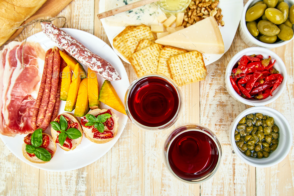 Italian antipasti wine snacks set. Antipasto catering platter Stock Photo by bondarillia