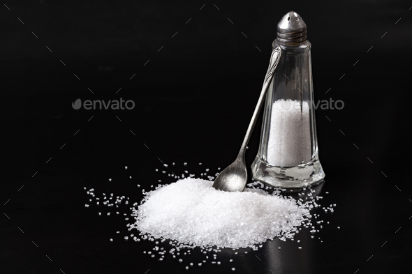 Silver Spoon and Salt - Stock Photo - Images