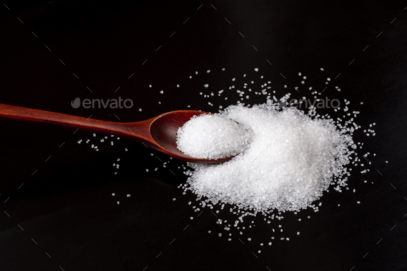 Brown Spoon on Salt - Stock Photo - Images