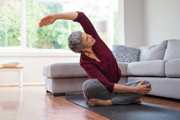 Download Mature woman in yoga pose Stock Photo by Rido81 | PhotoDune