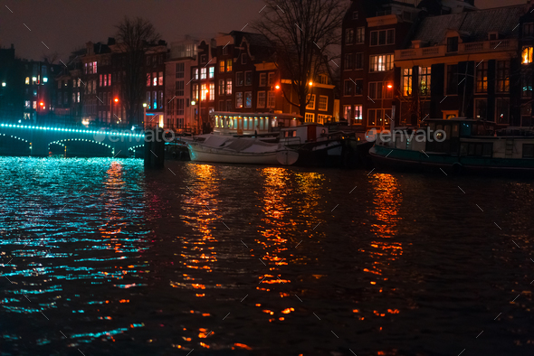 Night illumination of buildings and boats in the canal. - Stock Photo - Images