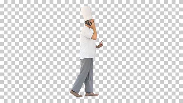 Chef speaking on the phone while walking, Alpha Channel alt
