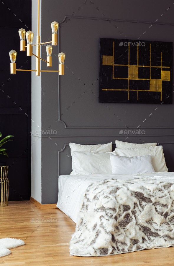 Real photo of a glamour hotel room interior with a double bed, p Stock Photo by bialasiewicz