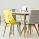 Yellow and grey chair at dining table in apartment interior with - $5.00 Yellow and grey chair at dining table in apartment interior with