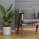 A silver side table and an elegant, upholstered armchair in a mo - $5.00 A silver side table and an elegant, upholstered armchair in a mo