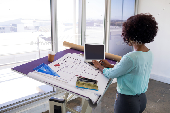 architect office supplies kitchen female architect working over laptop stock photo images by wavebreakmedia architect office supplies kitchen female architect working over laptop stock photo images by wavebreakmedia