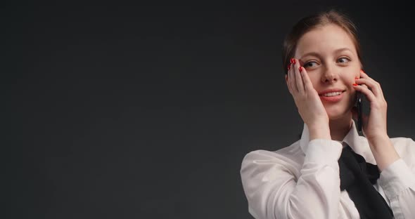 Yong Manager Woman in Business Suit Has a Talk Via Mobile Phone Work with Objections Sells By the alt