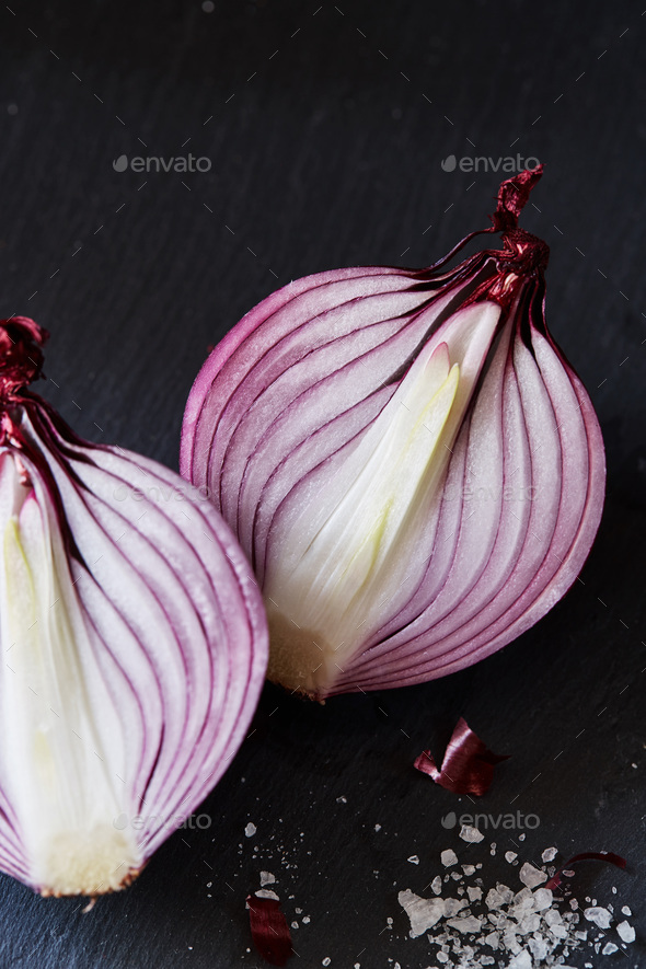 Sliced red spanish onion with and sea salt - Stock Photo - Images