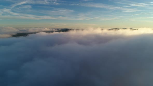 Drone Flight Above Moving Cloudscape alt