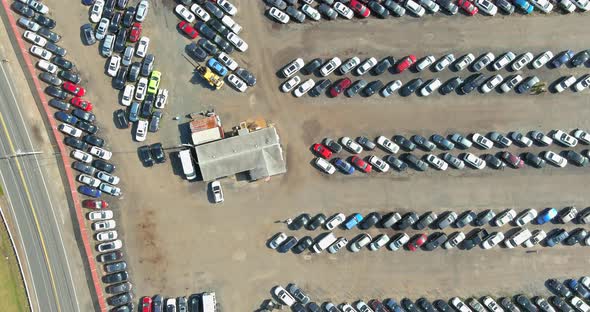 Panorama view in many a used cars terminal car parking auction lot alt