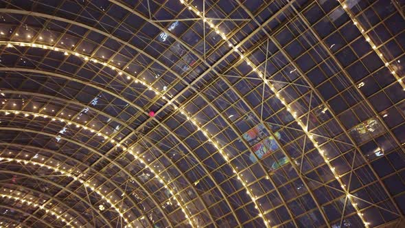 Glass Roof of a Modern Building Evening Time with Lighting.