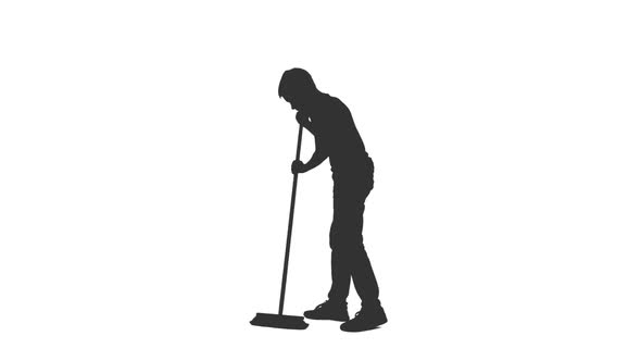 Silhouette of Teen Boy Sweeps Floor With Mop