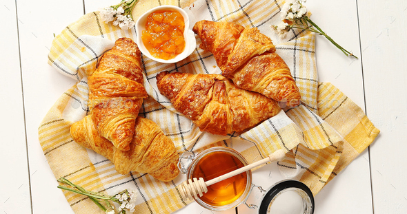 Croissants and condiments composition - Stock Photo - Images