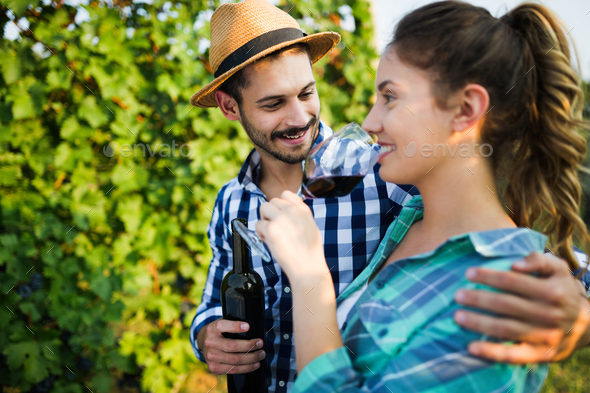 Wine tourists tasting wine in vineyard Stock Photo by nd3000 | PhotoDune