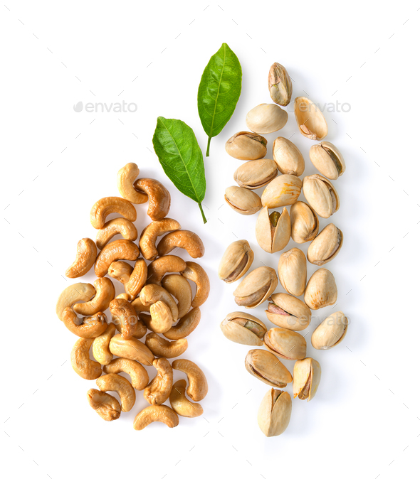 Roasted cashews. Pistachios isolated on white background, top vi