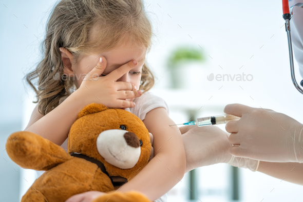 vaccination to a child - Stock Photo - Images