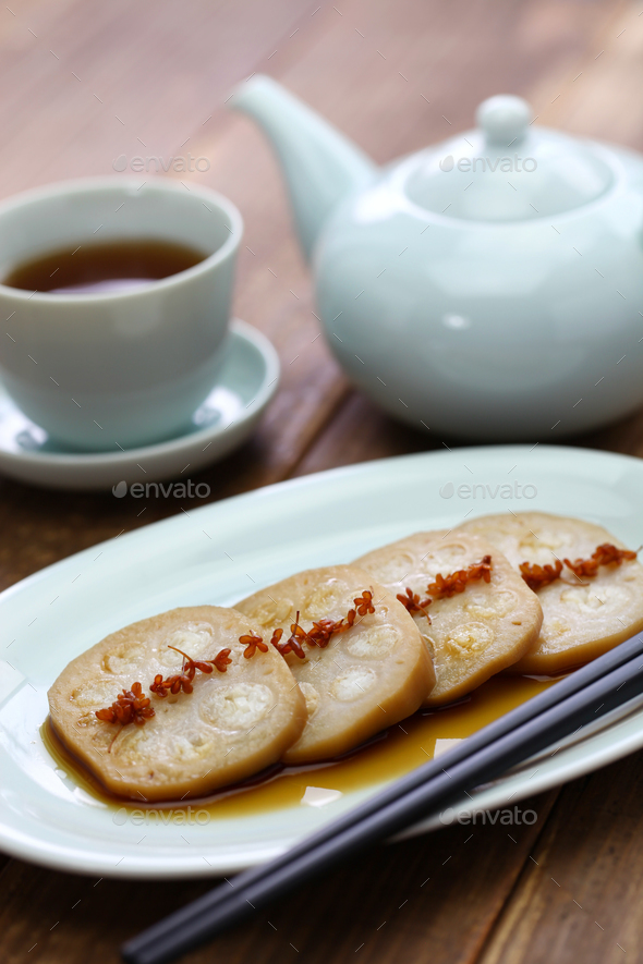 osmanthus flavored, stuffed lotus root with glutinous rice, chinese food Stock Photo by motghnit