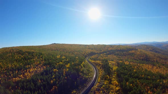 Aerial Tracking of a Freight Train in the Forest alt