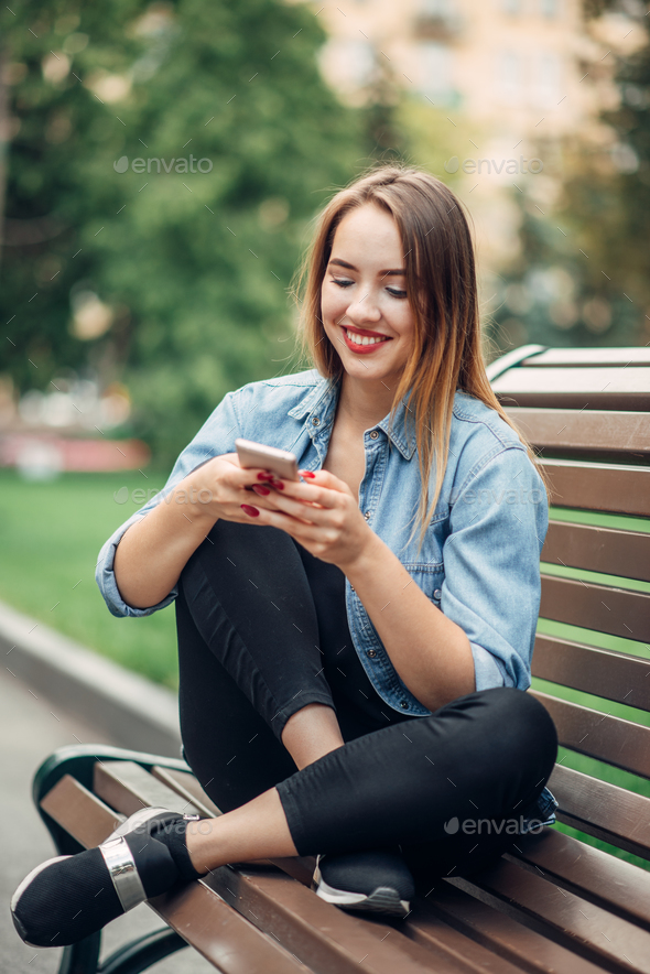 Phone addiction, addict woman using smartphone Stock Photo by NomadSoul1