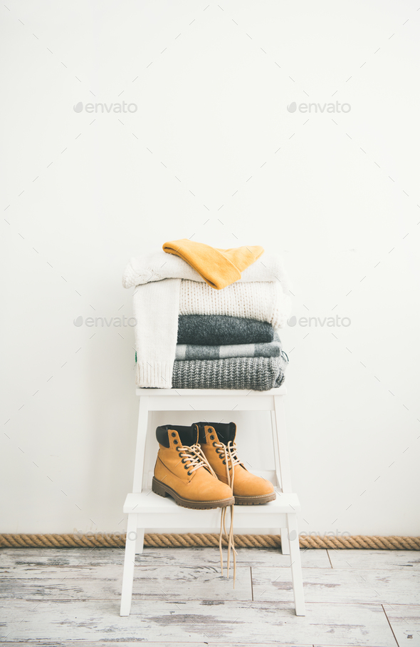 Warm clothing, blankets, boots and cap for cold weather - Stock Photo - Images