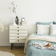A bright bedroom interior with sage green and white bedding, pil - $5.00 A bright bedroom interior with sage green and white bedding, pil