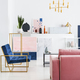 Vertical view of pink velvet couch and blue armchair in living r - $5.00 Vertical view of pink velvet couch and blue armchair in living r