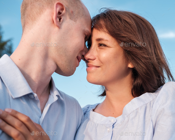 Young couple looking on each other with love. - Stock Photo - Images