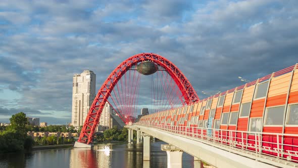 Red modern cable-stayed bridge across the river, Moscow, Russia alt