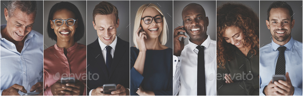 Diverse group of smiling business professionals using cellphones - Stock Photo - Images
