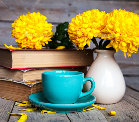 Flowers. Beautiful yellow chrysanthemum in a vintage vase. Cup of coffee. Bright Servais - Stock Photo - Images