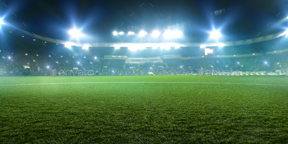 Football stadium, shiny lights, view from field - Stock Photo - Images