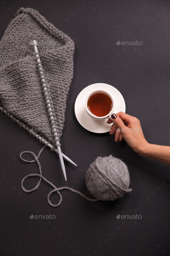 Close-up of knitting on black background - Stock Photo - Images