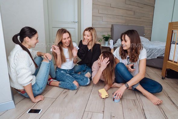 girls on the floor have fun - Stock Photo - Images