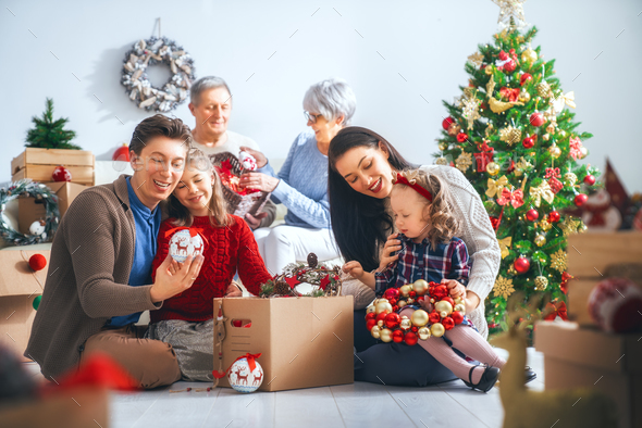 family preparing for Christmas - Stock Photo - Images