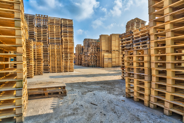 Piles of euro type cargo pallets - Stock Photo - Images