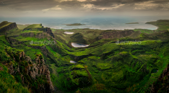 Panoramic landscape view of Quiraing coastline in Scottish highlands, Scotland, UK - Stock Photo - Images