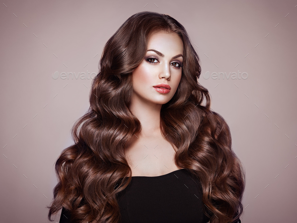 Brunette Woman With Curly Hair Stock Photo By Heckm