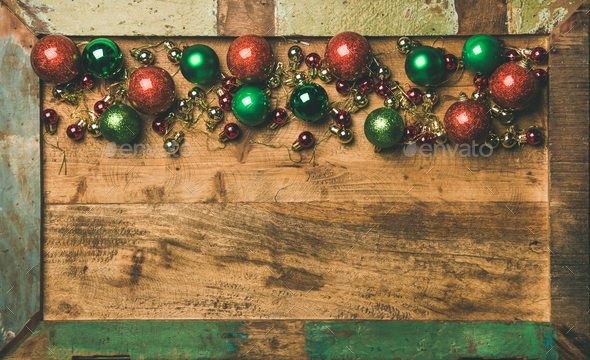 Colorful christmas tree decoration balls on wooden tray background - Stock Photo - Images