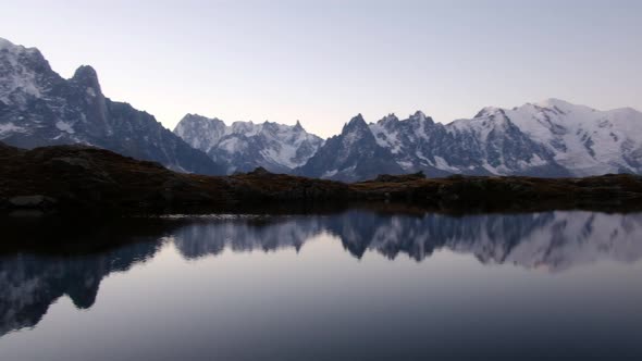 Colourful Sunrise on Chesery Lake in France Alps