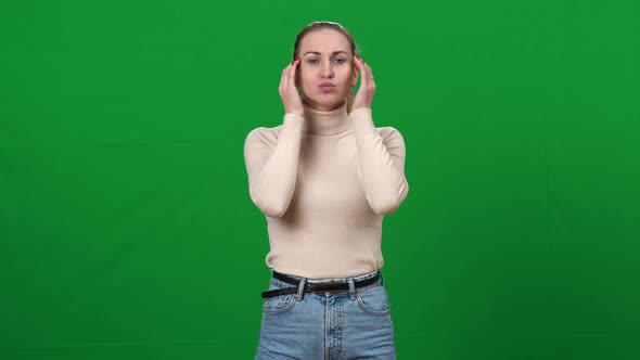 Confident Professional Actress Making Articulation Warmup at Chromakey Background alt