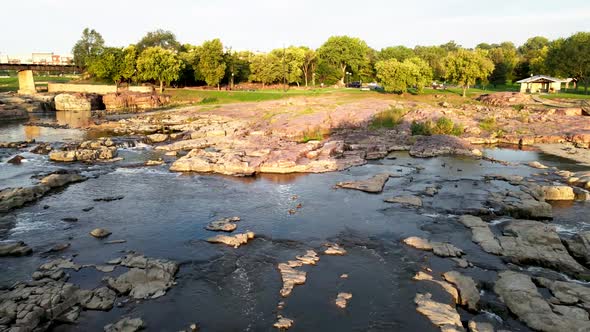 Aerial View of Sioux Falls Park in South Dakota with Rail bridge across the Big Sioux River