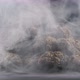 Close-up shot of cloud of smoke with cannabis marijuana buds on dark set. - VideoHive Item for Sale