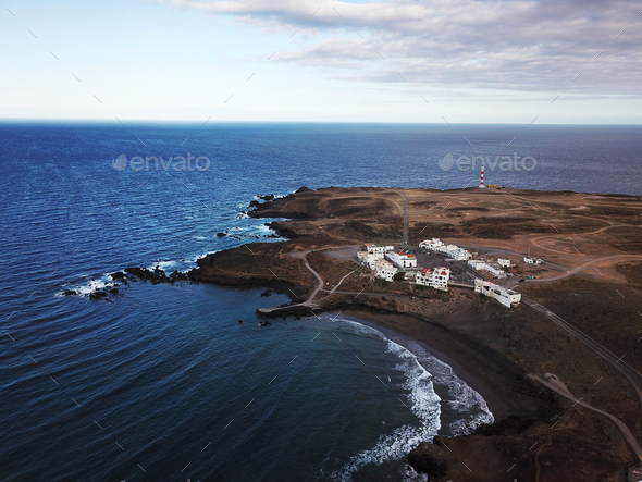 View from the height of rocky coastline with white buildings and - Stock Photo - Images