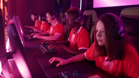 Focused Gamers Plays a Video Game Cyber Sportsmans Communicates During the Intense Game Team Play at alt