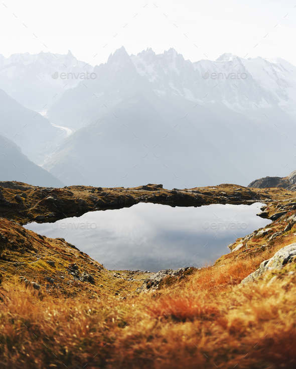 Colourful sunset on Chesery lake in France Alps - Stock Photo - Images