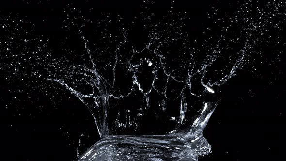 Super Slow Motion Shot of Water Splash at 1000Fps Isolated on Black Background alt