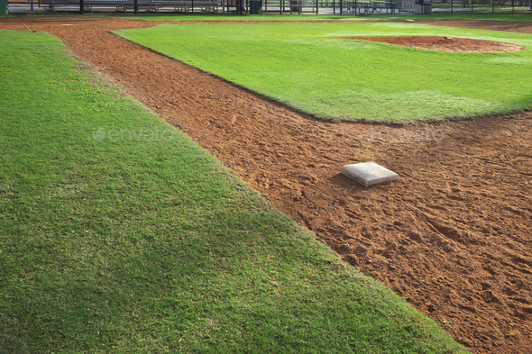 Baseball field from first base side in morning light Stock Photo by  DanThornberg