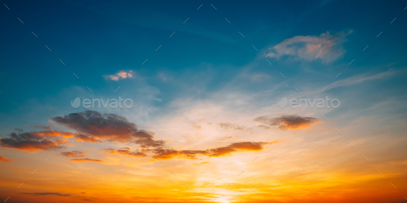 Sunset Sunrise Sky Background. Bright Dramatic Sky In Yellow, Or Stock  Photo by Grigory_bruev