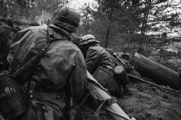 German Wehrmacht Infantry Soldiers In World War II Hidden Sittin - Stock Photo - Images