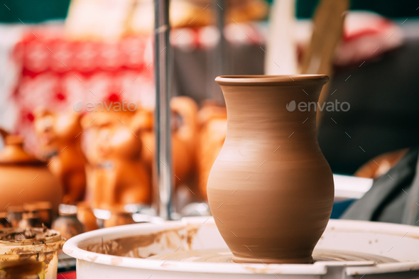 Pottery Craft Wheel And Ceramic Clay Pot. Traditional New Handma - Stock Photo - Images